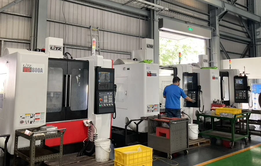 Machining centers and an operator in the BYTE source photograph